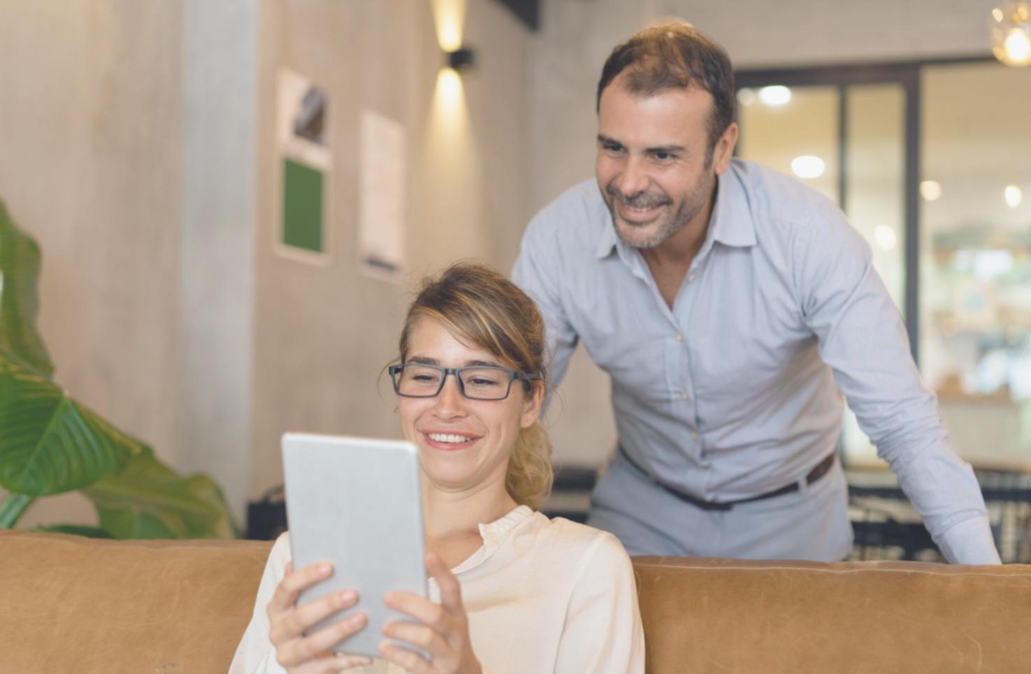 Business professionals collaborating on financial strategy documents in modern Melbourne office